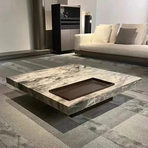 Titan | Table basse en pierre frittée effet marbre, piétement inox, plateau coulissant