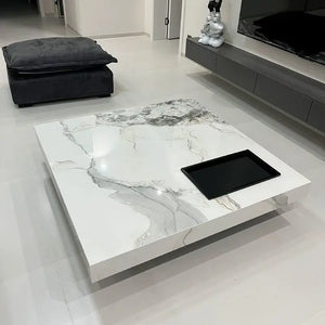 Titan | Table basse en pierre frittée effet marbre, piétement inox, plateau coulissant